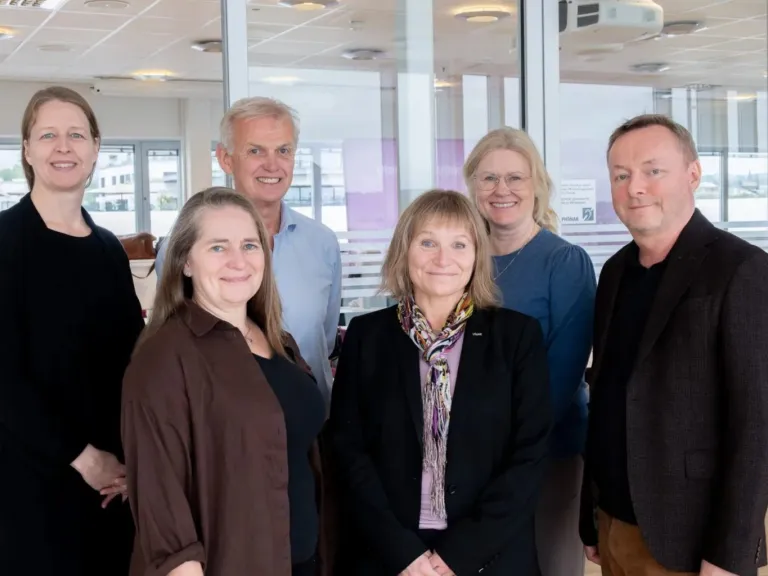 Forhandlerne fra arbeidsgiver- og arbeidstakersiden.